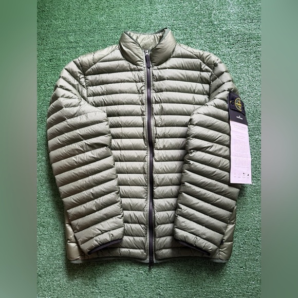 Stone island jacket size large. Hard to find green brand new with tags!